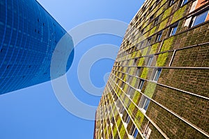 Modern Skyscraper and a building with an innovative system of green facade in Santiago