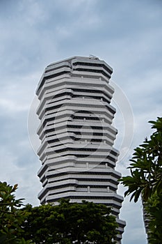 A modern skyscraper in the city-state of Singapore photo