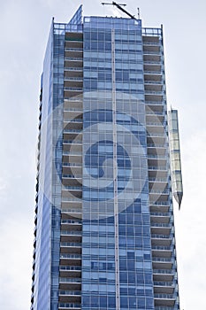 Modern skyscraper with windows and balconies. Toronto, Canada