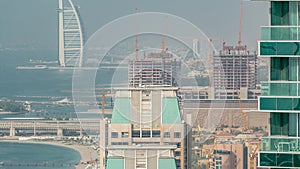 Modern skyscrapers in Jumeirah beach residence in Dubai, JBR aerial timelapse