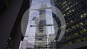 Modern, skyscrapers made of glass. Vertical panoramic view from below. Daytime