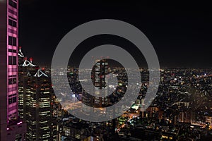 Modern skyscrapers and office buildings in Shinjuku at night