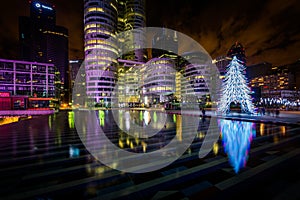 Modern skyscrapers and pool at night at La DÃÂ©fense, in Paris, F