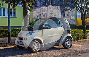 Modern small car Smart parked on a street