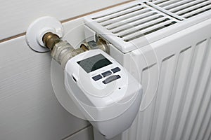 Modern smart heating valve with thermostat. Control room temperature