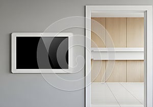Modern Smart Home Control Panel on Gray Wall with Door