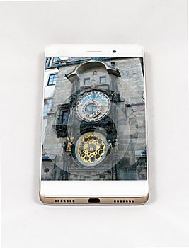 Modern smartphone displaying picture of Prague Astronomical Clock, Czech Republic