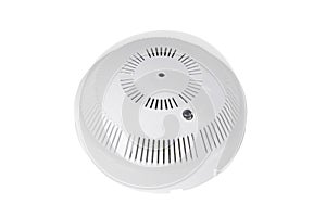 Modern smoke detector isolated on a white background. Round wall temperature sensor.