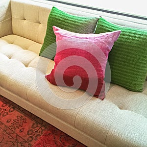 Modern sofa with bright cushions