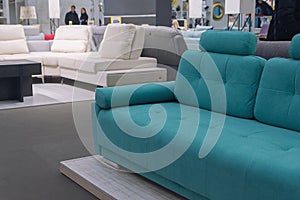 Modern sofas in the showroom of a furniture store