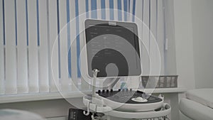 Modern sonography ultrasound device is in specialists office before medical examination of patient in private medical