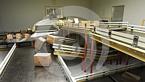 Modern sorting system conveyor concept cardboard boxes on conveyor 3d render