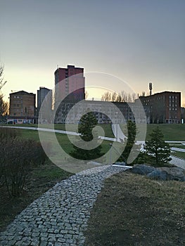 Modern and Soviet buildings. Paving slabs. Parks and streets of the city.