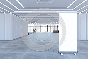 Modern spacious concrete and glass office interior with blank white mock up banner, furniture and panoramic windows with city view