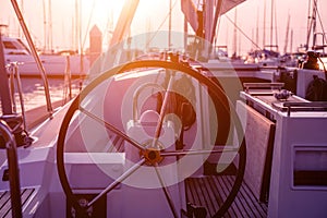 A modern speed boat yacht steering wheels.