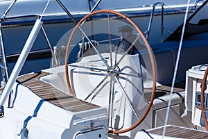 A modern speed boat yacht steering wheels. Background.