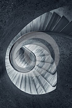 Modern spiral staircase. Contemporary architecture abstract background in monochrome