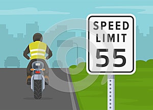 Modern sport motorcycle on a motorway, highway speed limit. Back view of a motorcycle rider.