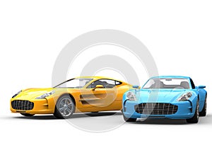 Modern sportscars side by side - blue and yellow