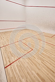 modern squash court room with white