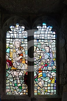 Modern stained glass windows in the church at Caldbeck in Cumbria