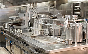 Modern stainless steel hobs in commercial kitchen