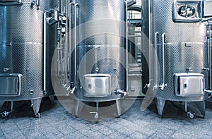 Modern stainless steel wine vats in winery