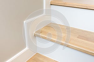 modern stair design with wooden tread and white riser photo