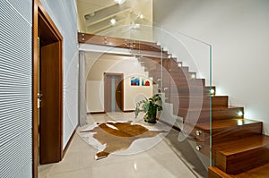 Modern stairs with glass handrail