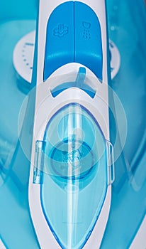 Modern steam iron closeup. View from above.