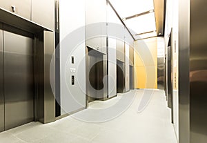 modern steel elevator cabins in a business lobby or Hotel, Store