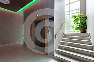 Modern steel elevator. Stairs, interior, office. perspective wide angle.