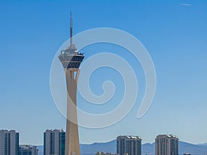Modern Stratosphere Tower Dominates Las Vegas Skyline Amidst Blue Skies and High-Rises
