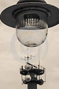 A modern street lamp against a blue sky