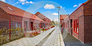 Modern street red brick houses panorama