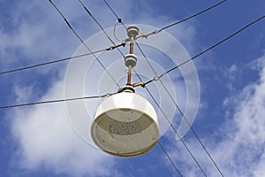 Modern streetlight in front of a blue sky