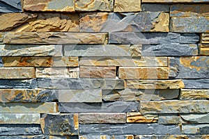 Modern style of decorative slate stone wall surface as a background texture pattern