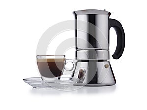 Modern style expresso coffee pot, and glass expresso cup and saucer full of smooth expresso coffee, isolated on white