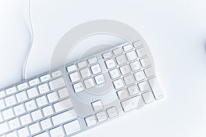 The modern and stylish keyboard for a computer Keyboard White wireless computer keyboard isolated on white background. English key