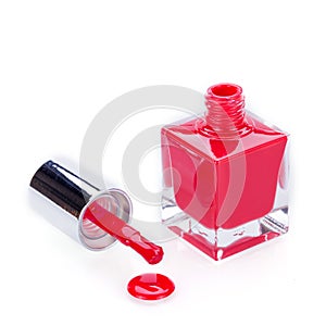 Modern stylish red nail varnish or lacquer photo