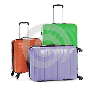 Modern suitcases for travelling on white background