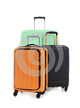 Modern suitcases for travelling on white background