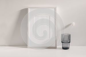 Modern summer artistic still life scene. Grey rippled glass vase with dry lagurus, bunny tail grass. Table background in