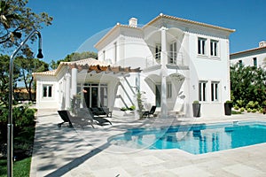 Modern Summer Mansion with Patio and Blue Pool