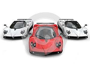 Modern super race cars - red and white side by side