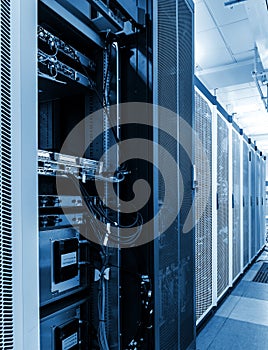 Modern supercomputer in data center close up. High capacity hard drive disk storage rack used for big data cloud