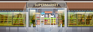Modern supermarket retail store with assortment of groceries grocery shop exterior horizontal