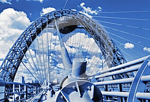 Modern suspension bridge toned in blue color in Moscow