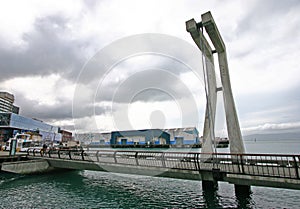 Modern suspension pathway with concrete pier and suspension cable on North Kumutoto waterfront, Wellington, New Zealand