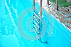Modern swimming pool with stairs